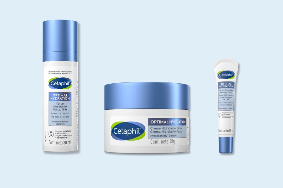 Embalagens de produtos para pele do rosto ressecada, da esquerda para a direita, Sérum Hidratante Facial Cetaphil Optimal Hydration, Creme Hidratante Facial Cetaphil Optimal Hydration e Sérum área dos Olhos Cetaphil Optimal Hydration.